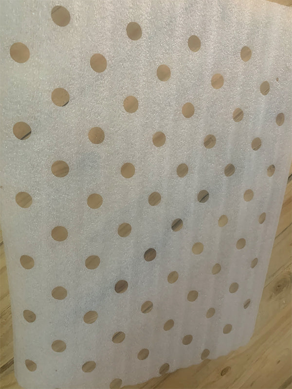 Protective Fruit Packaging with Perforations